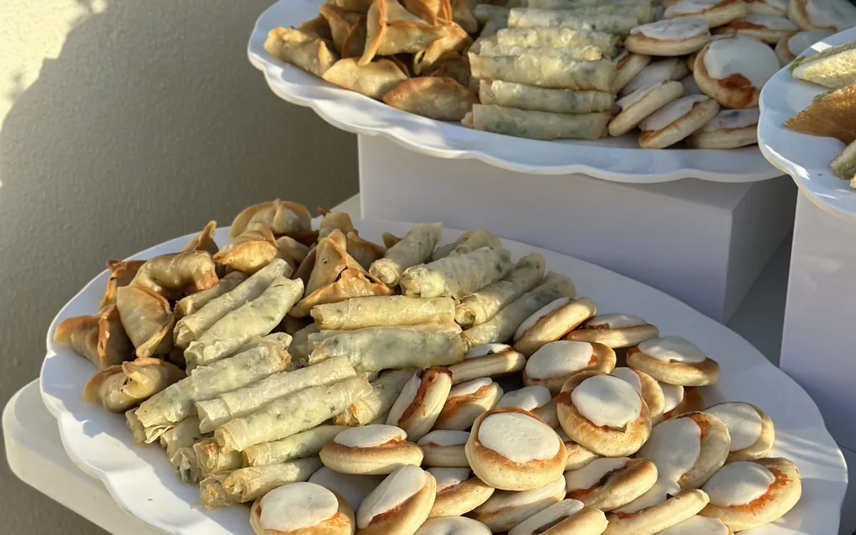 La Tavola catering buffet with mini pastries in a Beirut garden